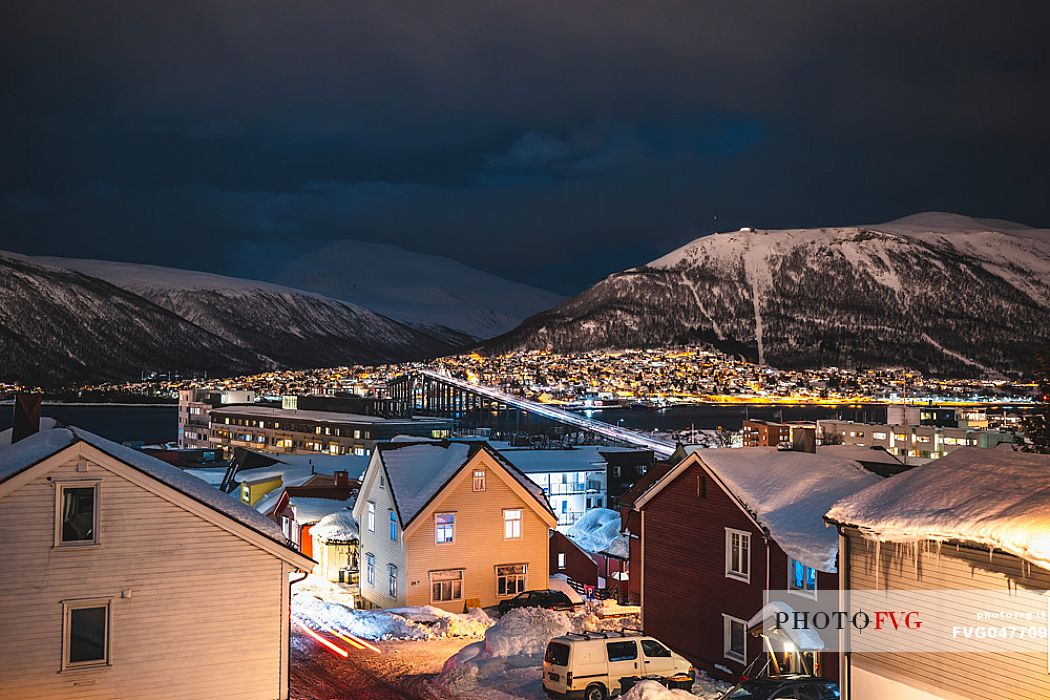 Tromso, view of the city by night from the Fogd Drejers gate 27-33 street, Norway, Europe