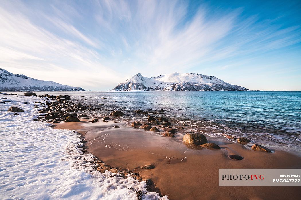 Island of sessya from the beach of Rekvik,a small village near Tromvik, Tromso, Norway, Europe
