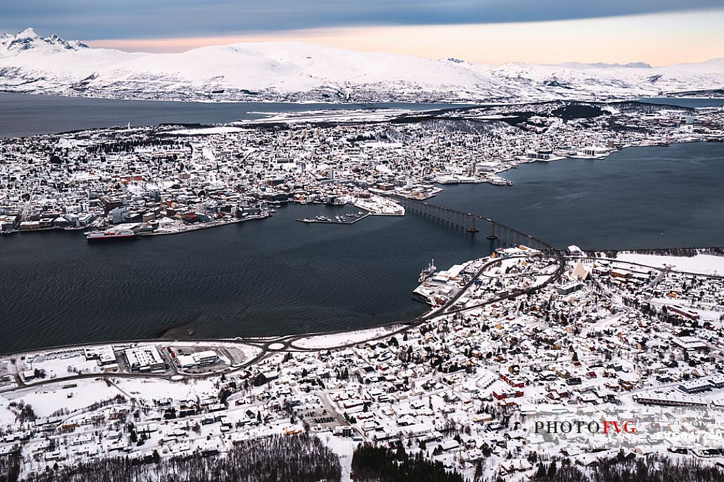 View from Storsteinen Hill (418m) of the city  of Tromso and Tromsoeysund with Tromsoe Bridge, Norway, Europe
