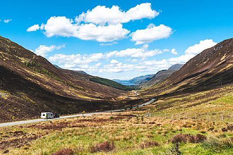 Caravan in Glen Docherty, in the background the Loch Maree, Highlands, Scotland, United Kingdom Caravan in Glen Docherty, in the background the Loch Maree, Highlands, Scotland, United Kingdom