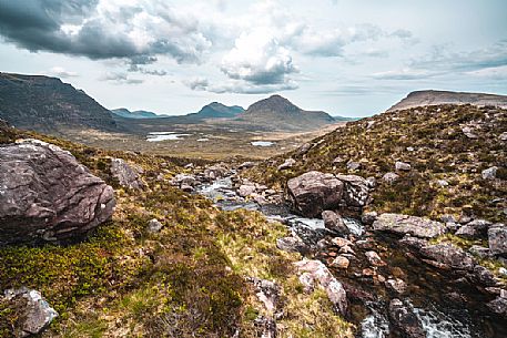 The river born from a glacier lake up the mountain in the Beinn Eighe national nature reserve, Torridon, Highlands, Scottish, United Kingdom