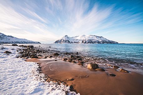 Island of sessya from the beach of Rekvik,a small village near Tromvik, Tromso, Norway, Europe
