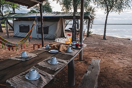 Camping on the shore of Flamenco lagoon, a salt lagoon in the Paraguayan Chaco near the Reserva Natural - Campo Mara, Paraguay, America