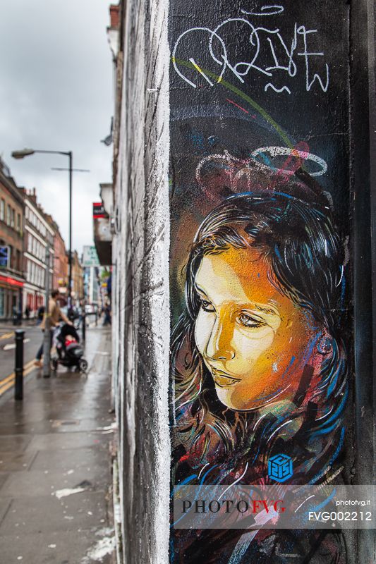 Street art work in London borough of Shoreditch