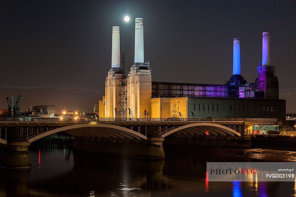 Battersea Power Station reflected on the Thames with full moon 