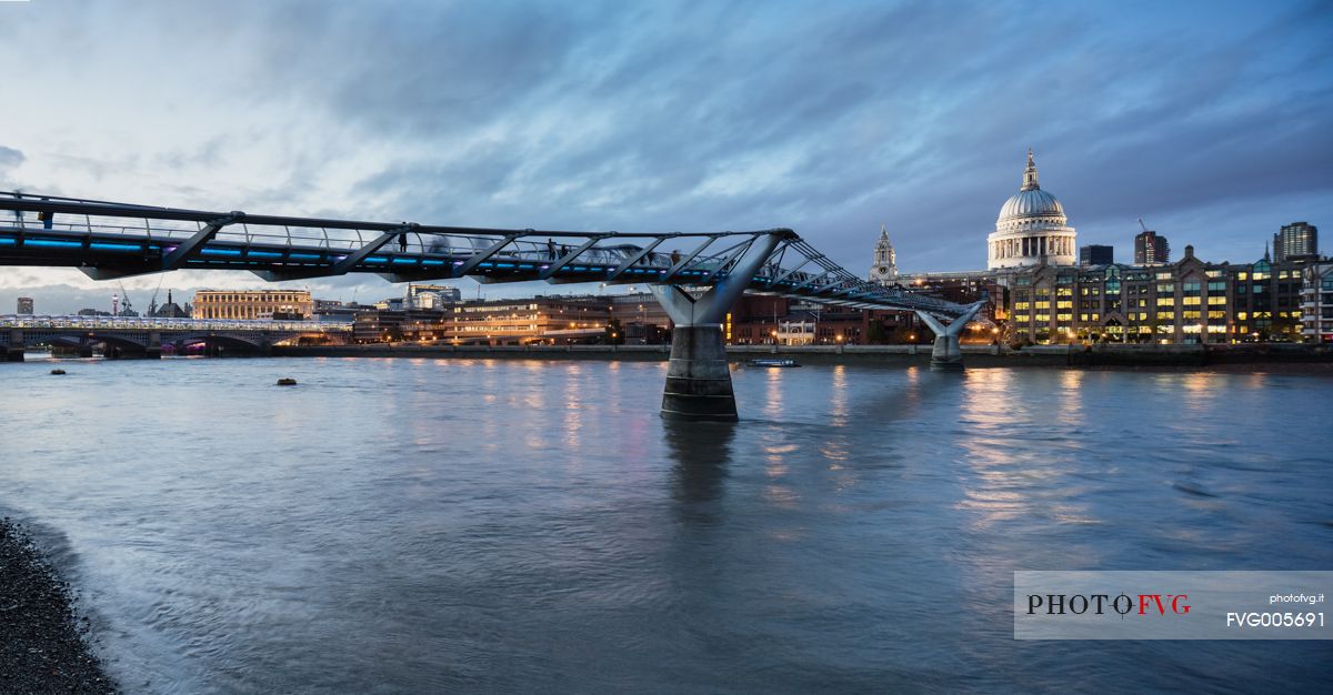 The Millennium Bridge and St Paul's Cathedral at dusk