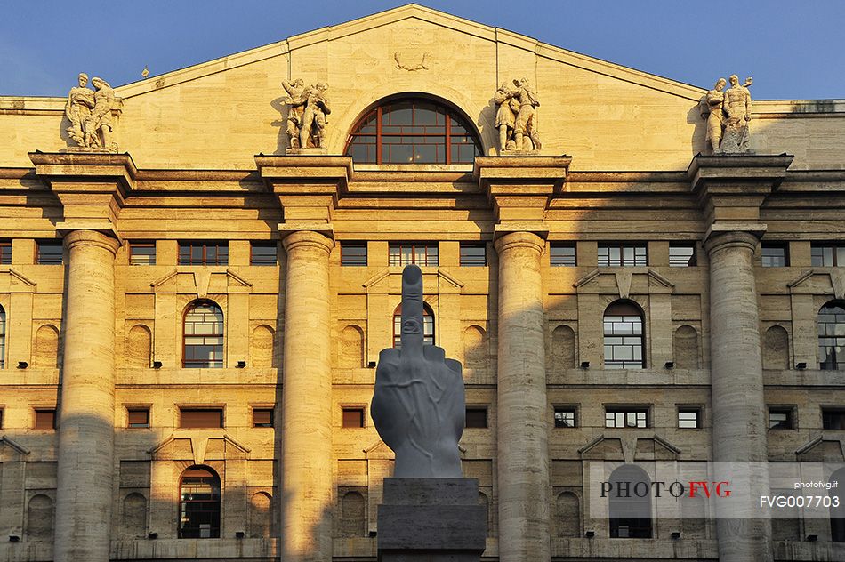 Milan Stock Exchange Palace and the provocative L.O.V.E. sculpture by Cattelan