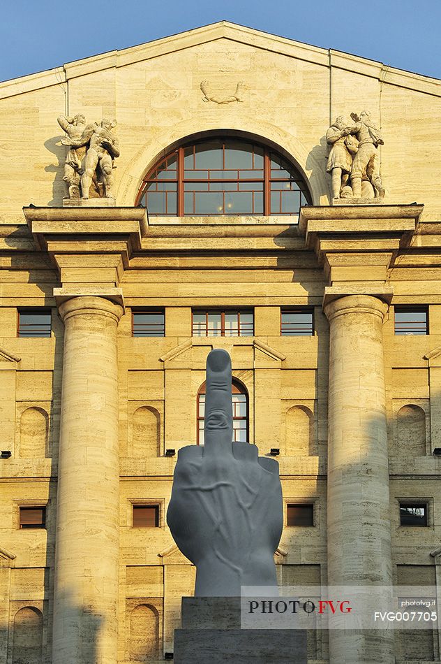 Milan Stock Exchange Palace and the provocative L.O.V.E. sculpture by Cattelan