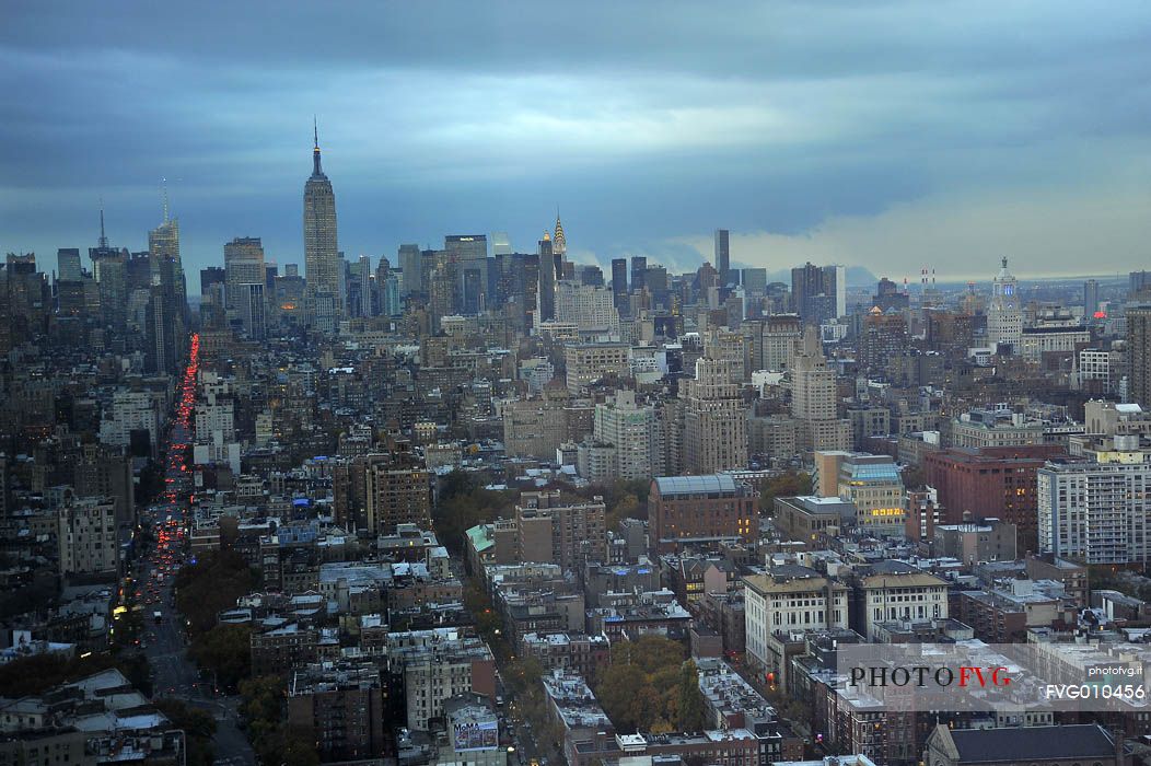 Overview of Manhattan buildings from the 46th floor of the Trump SoHo at the blue hour