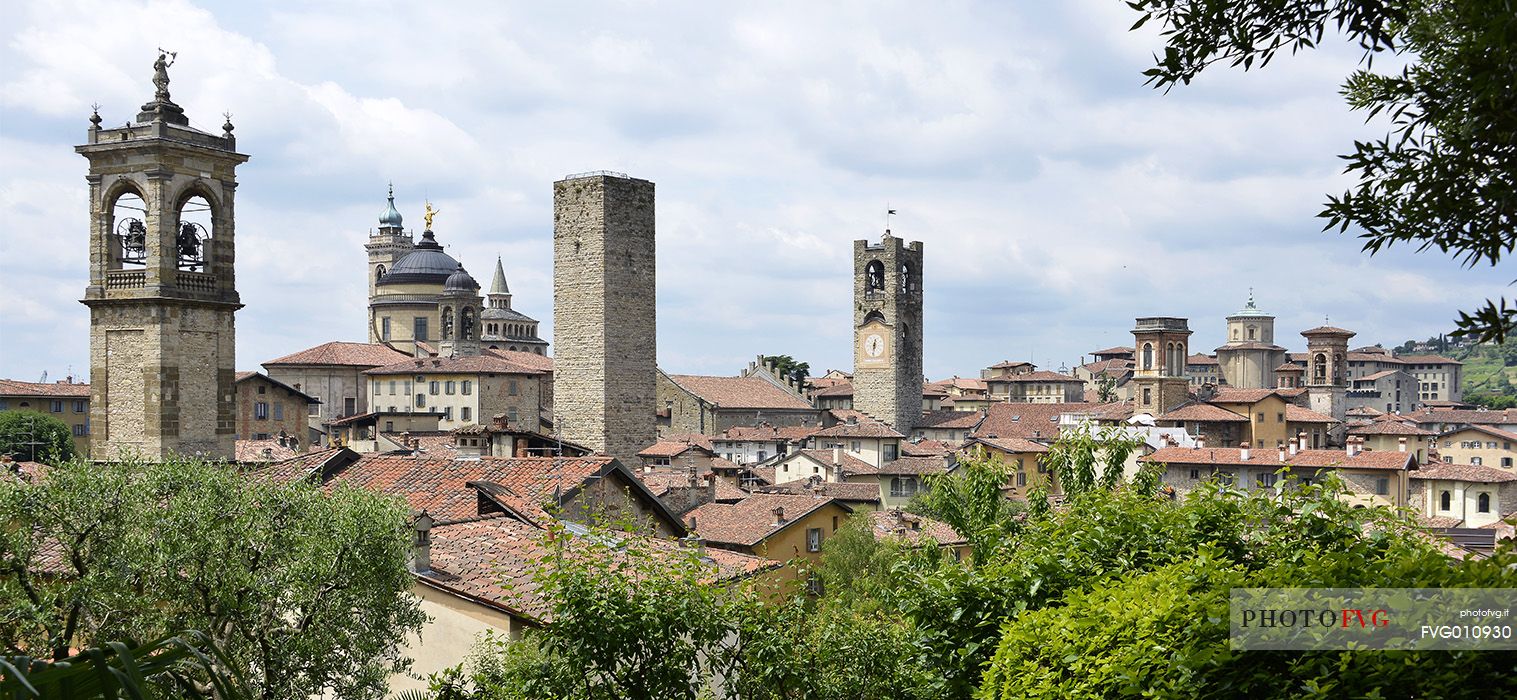 Towers and steeples of the upper city of Bergamo, view from Parco della Rimembranza