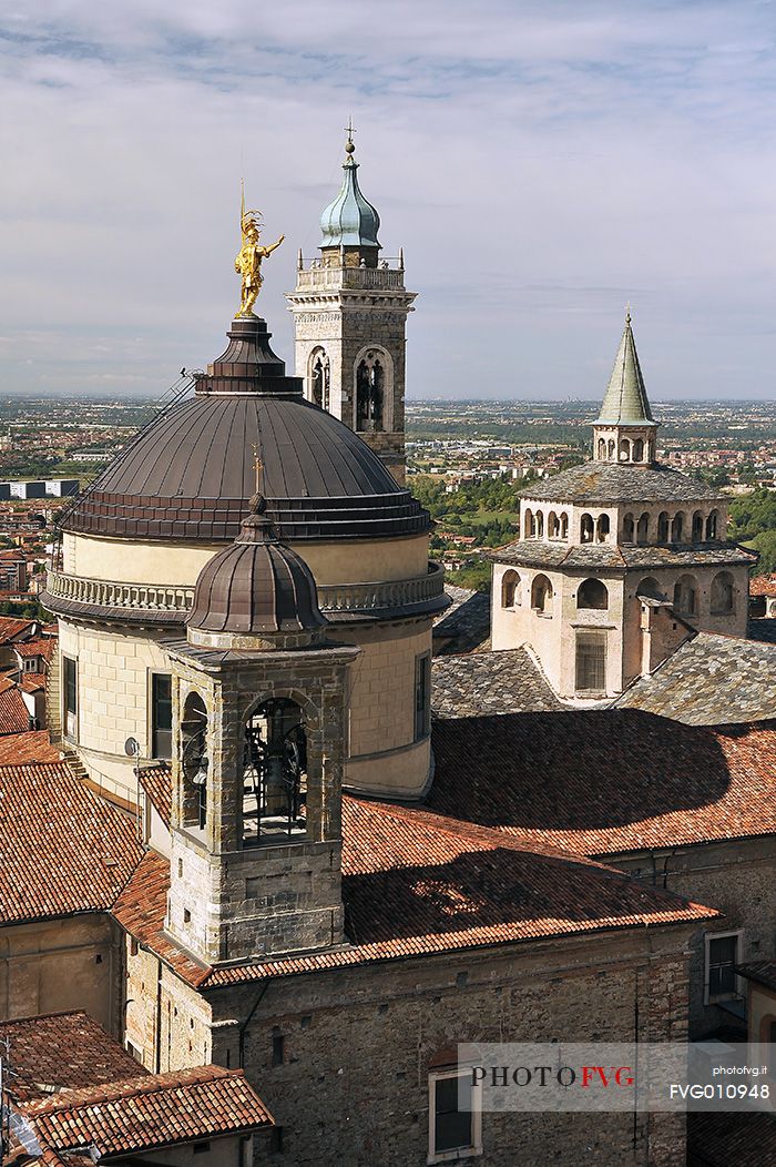 Clock Tower and Dome of the Cathedral, Clock Tower and Dome of the Basilica in the upper city of Bergamo, view from Torre del Gombito