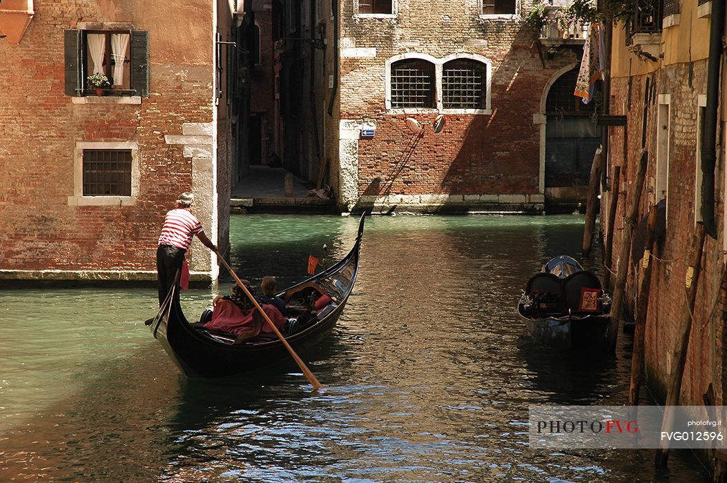 Gondolier in Venice canals