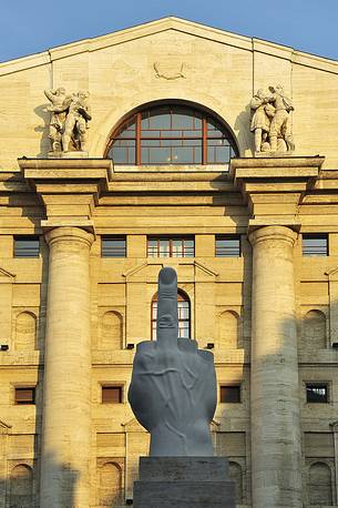 Milan Stock Exchange Palace and the provocative L.O.V.E. sculpture by Cattelan