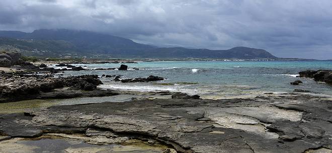 Rocks by the sea on beach of Falassarna