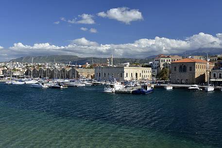 The marina and venetian shipyards in the old harbour of Chania, Crete Island, Greece, Europe