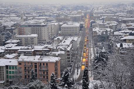 Lower city of Bergamo from the venetian walls of the upper city after a snowfall Lower city of Bergamo from the venetian walls of the upper city after a snowfall