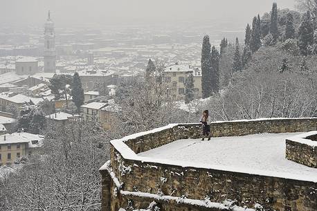 Lower city of Bergamo from the venetian walls of the upper city after a snowfall Lower city of Bergamo from the venetian walls of the upper city after a snowfall