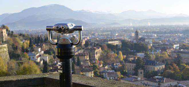 View of the lower city and the mountains from Baluardo di San Giacomo in the upper city View of the lower city and the mountains from Baluardo di San Giacomo in the upper city