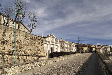 Old pedestrian street towards Porta San Giacomo in the upper city Old pedestrian street towards Porta San Giacomo in the upper city