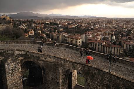 View of the lower city and the old pedestrian street towards Porta San Giacomo in the upper city View of the lower city and the old pedestrian street towards Porta San Giacomo in the upper city