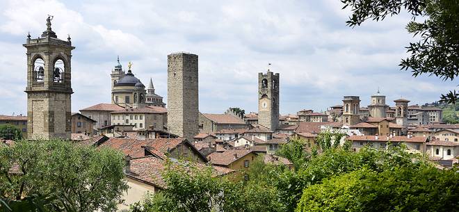 Towers and steeples of the upper city of Bergamo, view from Parco della Rimembranza