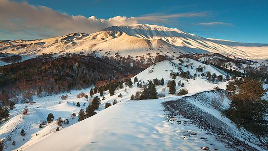 View of Etna from the edge of one of the Sartorius craters, in the background Monte Frumento