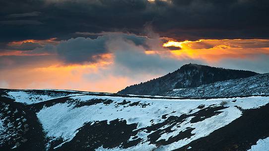 Sunset from the craters Silvestri, in the background Monte Vetore and rangers watchtower at the top 