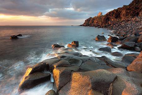 The cliff of Capomulini and its lighthouse