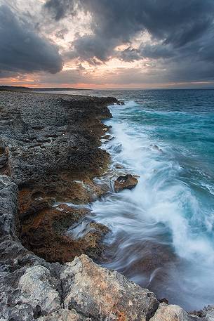 Brucoli reef at sunset