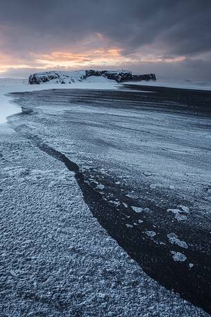 Sunrise on the snowy beach of Dyrhlaey