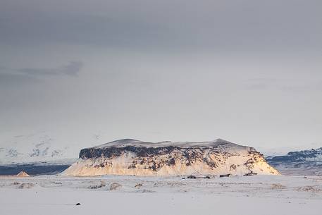 Snowy mountain behind Dyrhlaey beach