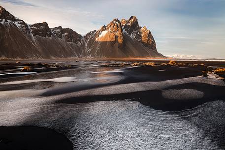 Black sand and snow on Stokksens beach