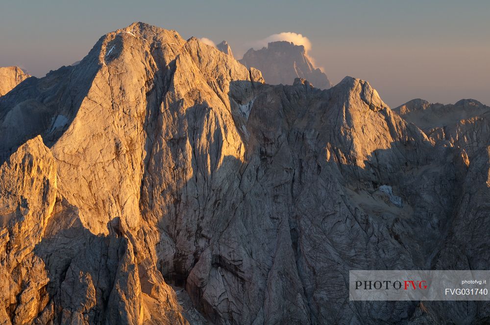 Sunset from the top of Piz Bo in the Sella mountain group towards Gran Vernel peak, dolomites, Italy