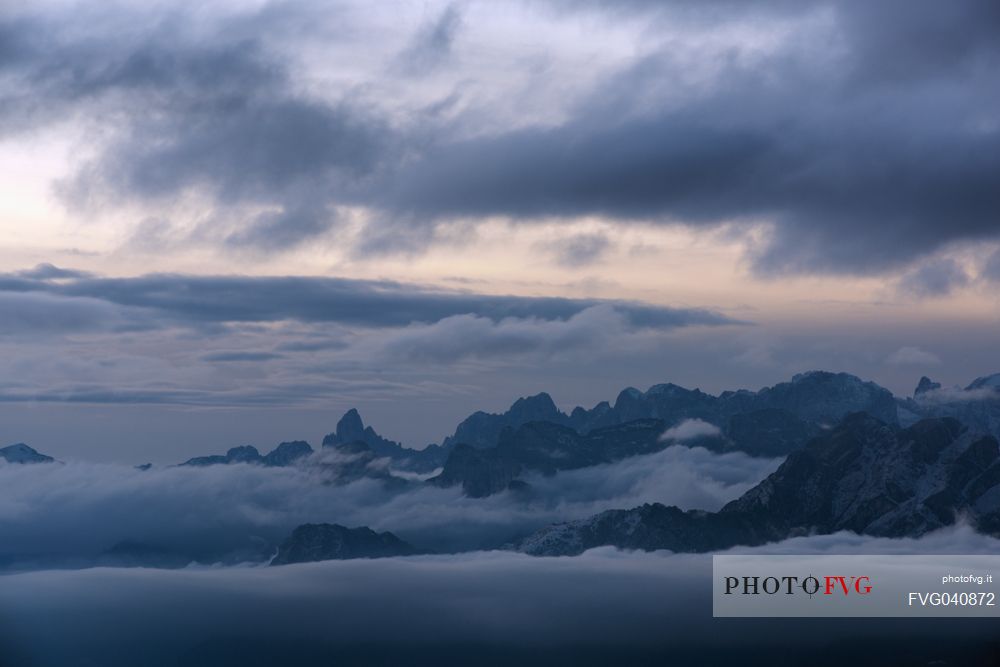 Unexpected views from the Alpago to the Pale di San Martino group, dolomites, Veneto, Italy, Europe