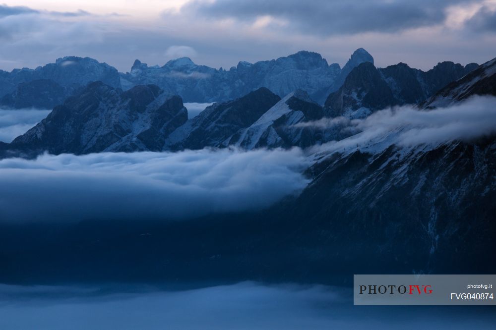 Unexpected views from the Alpago to the Pale di San Martino group and Mount Agner, dolomites, Veneto, Italy