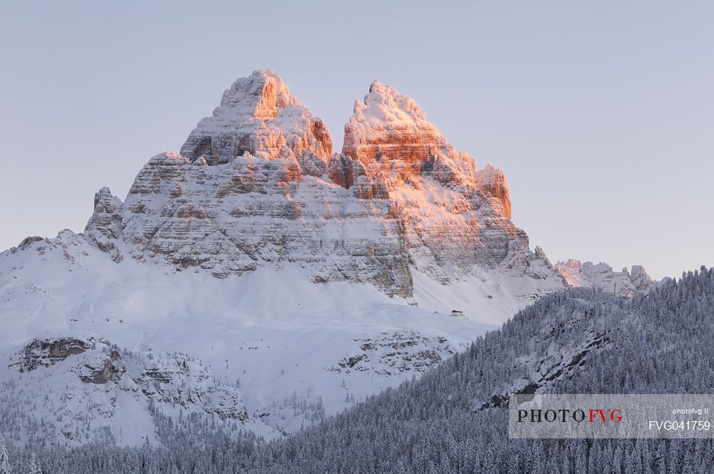 After a heavy snowfall on a cold winter morning, sunrise from Misurina towards the Tre Cime di Lavaredo peak, dolomites, Veneto, Italy, Europe