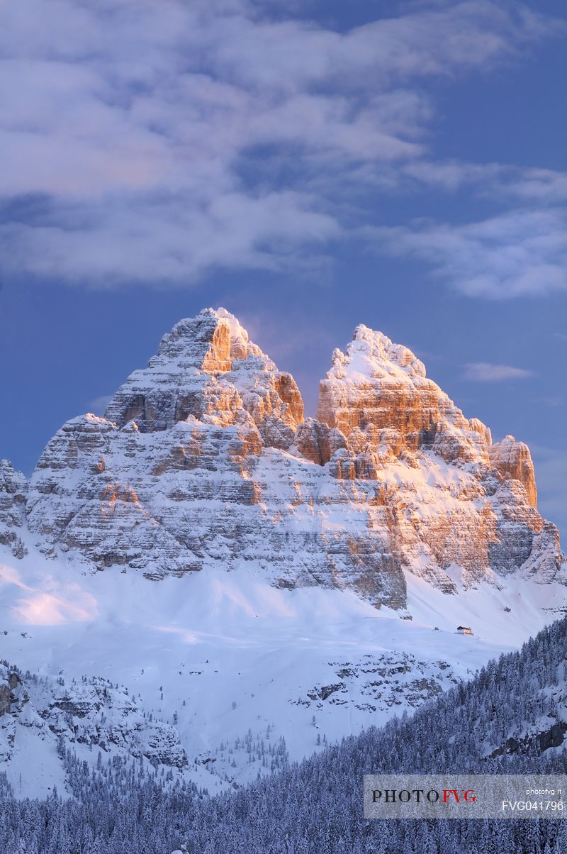 After a heavy snowfall on a cold winter morning, sunrise from Misurina towards the Tre Cime di Lavaredo peak, dolomites, Veneto, Italy, Europe