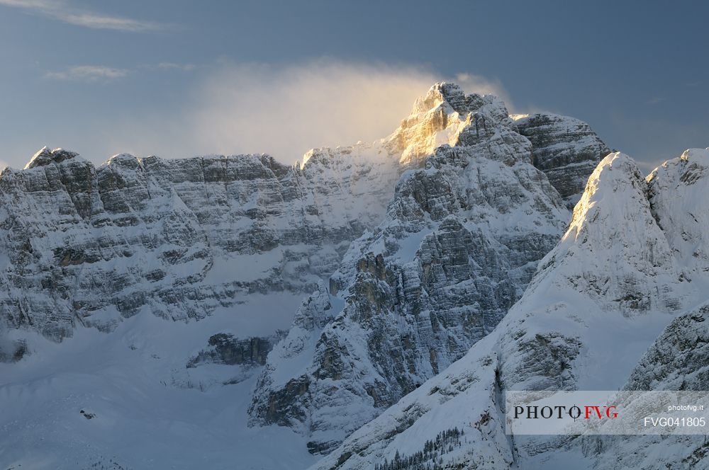 After a heavy snowfall on a cold winter morning, sunrise from Misurina towards the Sorapiss peak, Auronzo, Cadore, dolomites, Veneto, Italy, Europe
