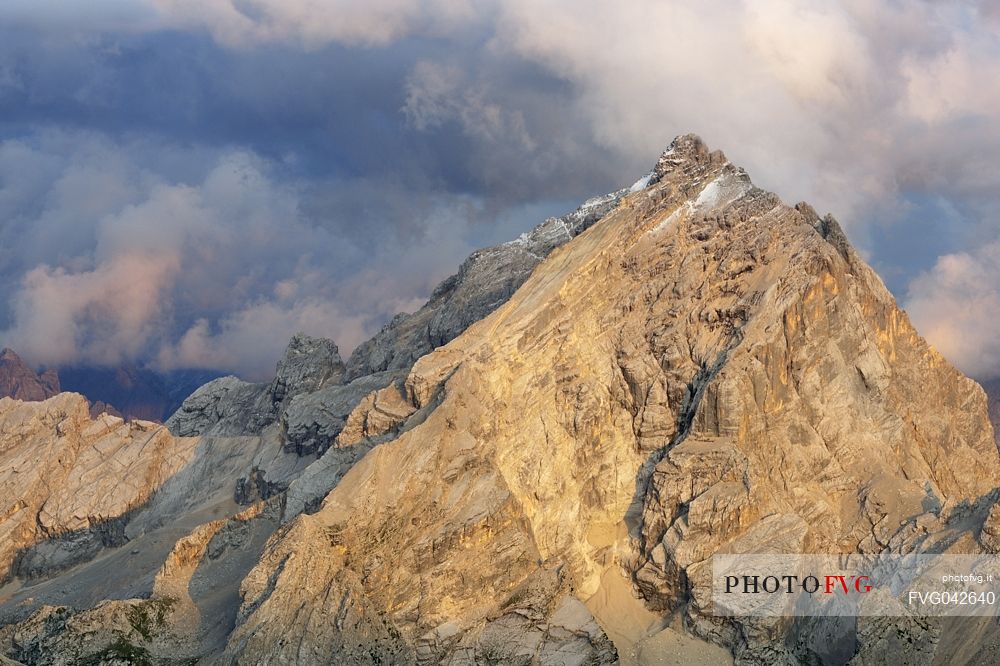 Monte Antelao peak at sunset in the storm from the top of Tofana di Mezzo, Cortina d'Ampezzo, dolomites, Italy.