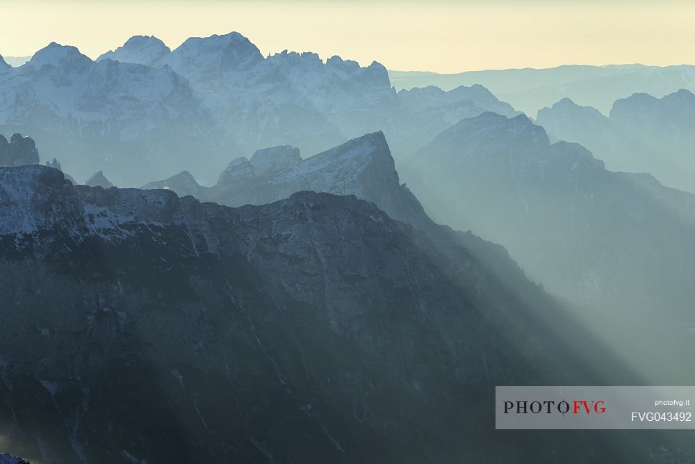 Pelf Schiara and Gusela del Vescov peaks at dawn from Punta Rocca (3265 m), one of the peaks of the Marmolada, dolomites, Veneto, Italy, Europe