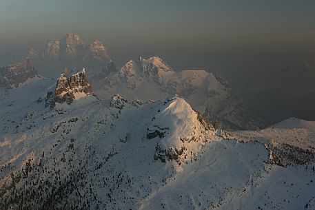 Foggy Sunset from the top of the mountain Lagazuoi towards Monte Pelmo, Averau and Nuvolau, Dolomites, Italy