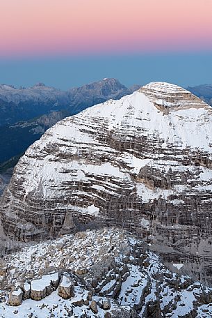 Dawn from the top of Tofana di Mezzo (3244 m) towards Tofana di Rozes after a slight summer snowfall, Cortina d'Ampezzo, dolomites, Italy Dawn from the top of Tofana di Mezzo (3244 m) towards Tofana di Rozes after a slight summer snowfall, Cortina d'Ampezzo, dolomites, Italy