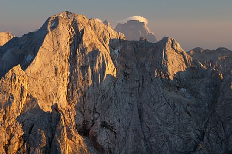 Sunset from the top of Piz Bo in the Sella mountain group towards Gran Vernel peak, dolomites, Italy