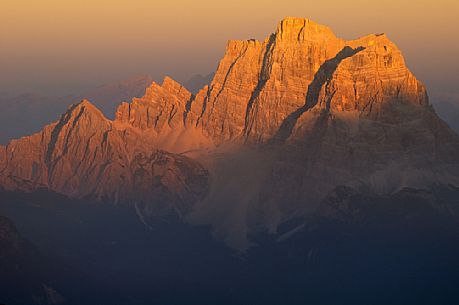 Sunset from the top of Piz Bo in the Sella mounatin group towards Pelmo peak, dolomites, Italy
