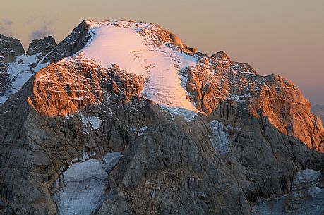 Sunset from the top of Piz Bo in the Sella mountain group towards Marmolada peak, dolomites, Italy