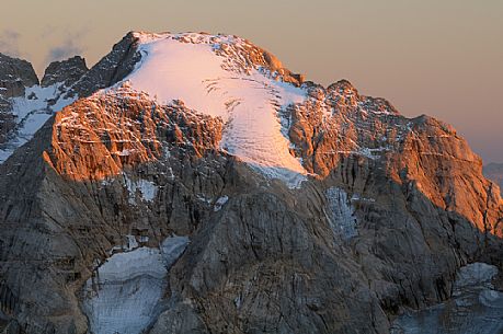 Sunset from the top of Piz Boč in the Sella mountain group towards Marmolada peak, dolomites, Italy Sunset from the top of Piz Boč in the Sella mountain group towards Marmolada peak, dolomites, Italy
