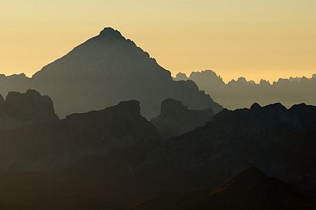 Sunset from the top of Piz Boč in the Sella mounatin group towards Antelao peak and dolomites of Cortina d'Ampezzo, Italy Sunset from the top of Piz Boč in the Sella mounatin group towards Antelao peak and dolomites of Cortina d'Ampezzo, Italy