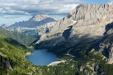 Marmolada mount and Fedaia lake from above, in the backgroundi the Civetta peak, dolomites, Italy, Europe