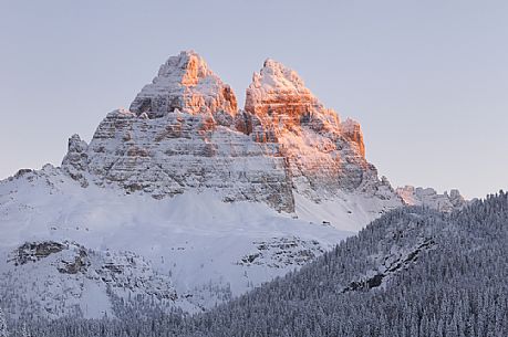 After a heavy snowfall on a cold winter morning, sunrise from Misurina towards the Tre Cime di Lavaredo peak, dolomites, Veneto, Italy, Europe