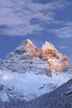 After a heavy snowfall on a cold winter morning, sunrise from Misurina towards the Tre Cime di Lavaredo peak, dolomites, Veneto, Italy, Europe